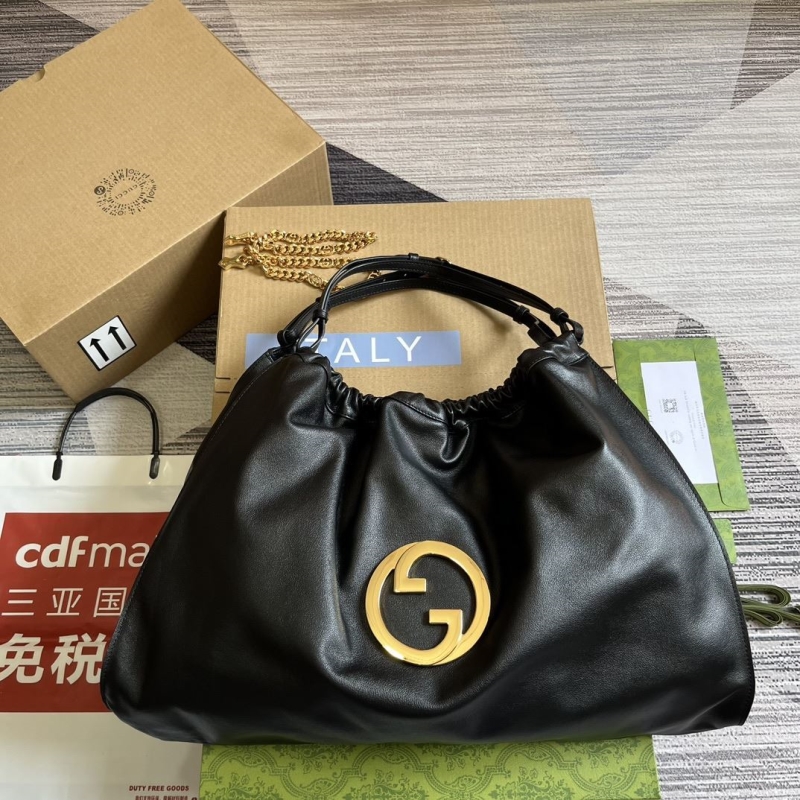 G*u*i top handle bags